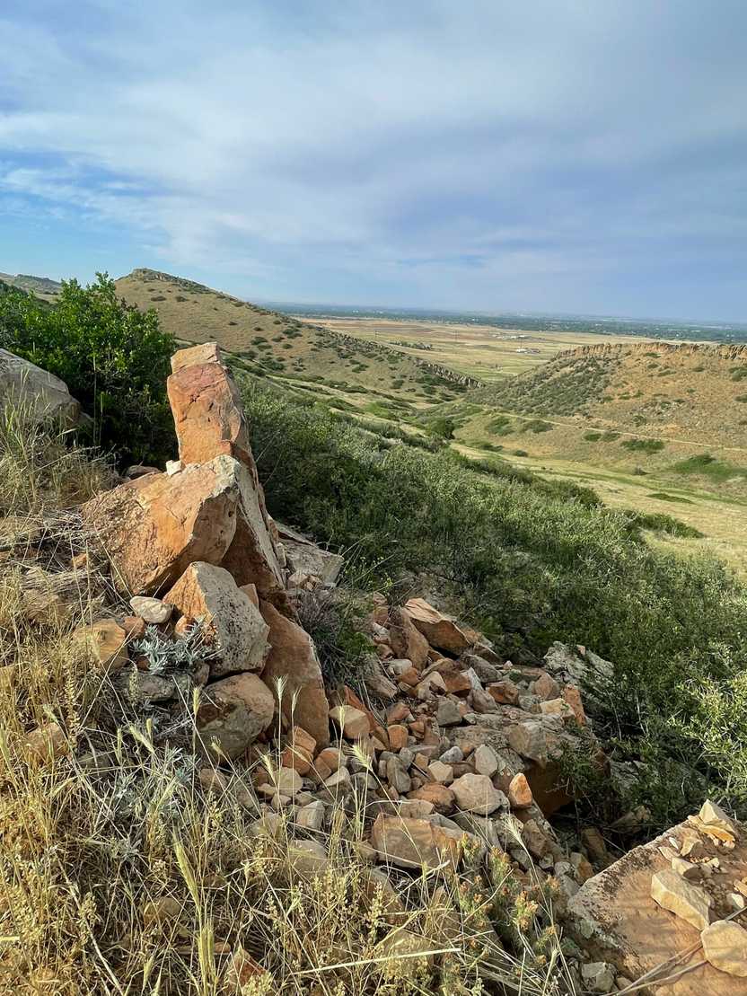 A view of a green valley from the Coyote Ridge Trail in Coyote Ridge Natural Area.