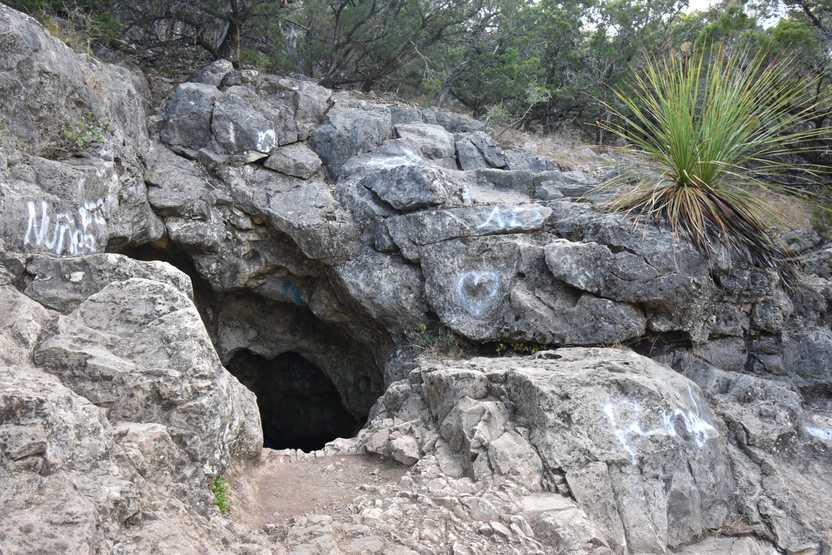 Looking at the Crystal Cave, which you climb down into from a rock face.