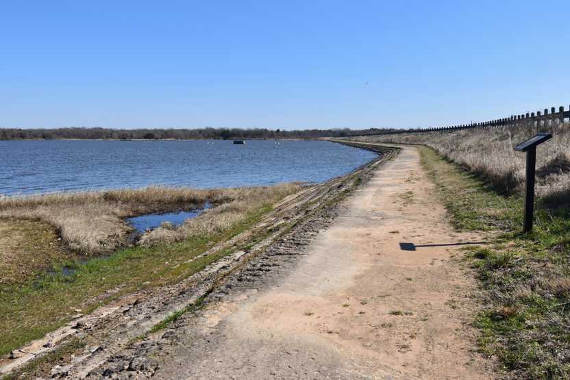 A trail along the lake in Purtis Creek State Park.