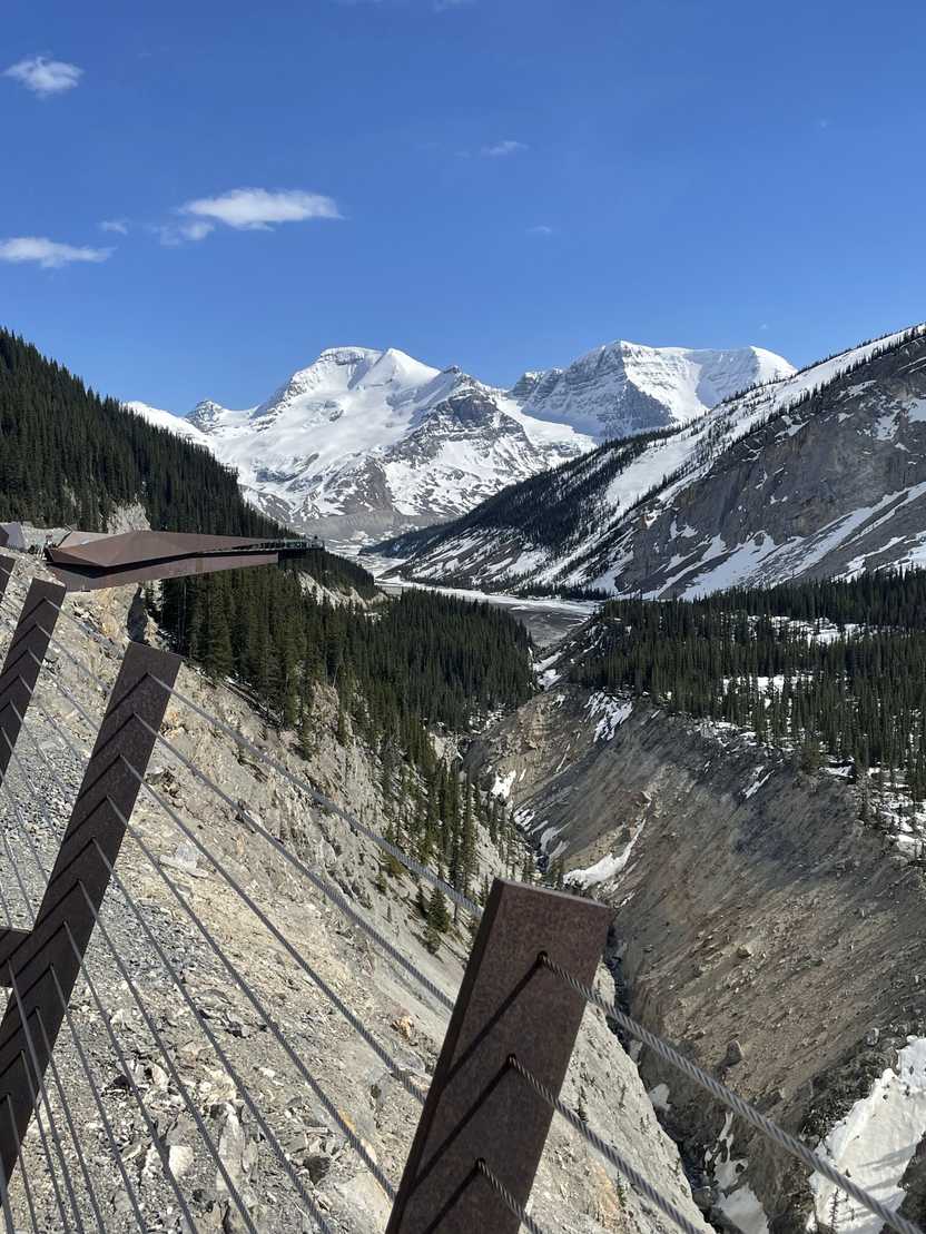 A canyon with a Skybridge that extends straight out into the canyon.