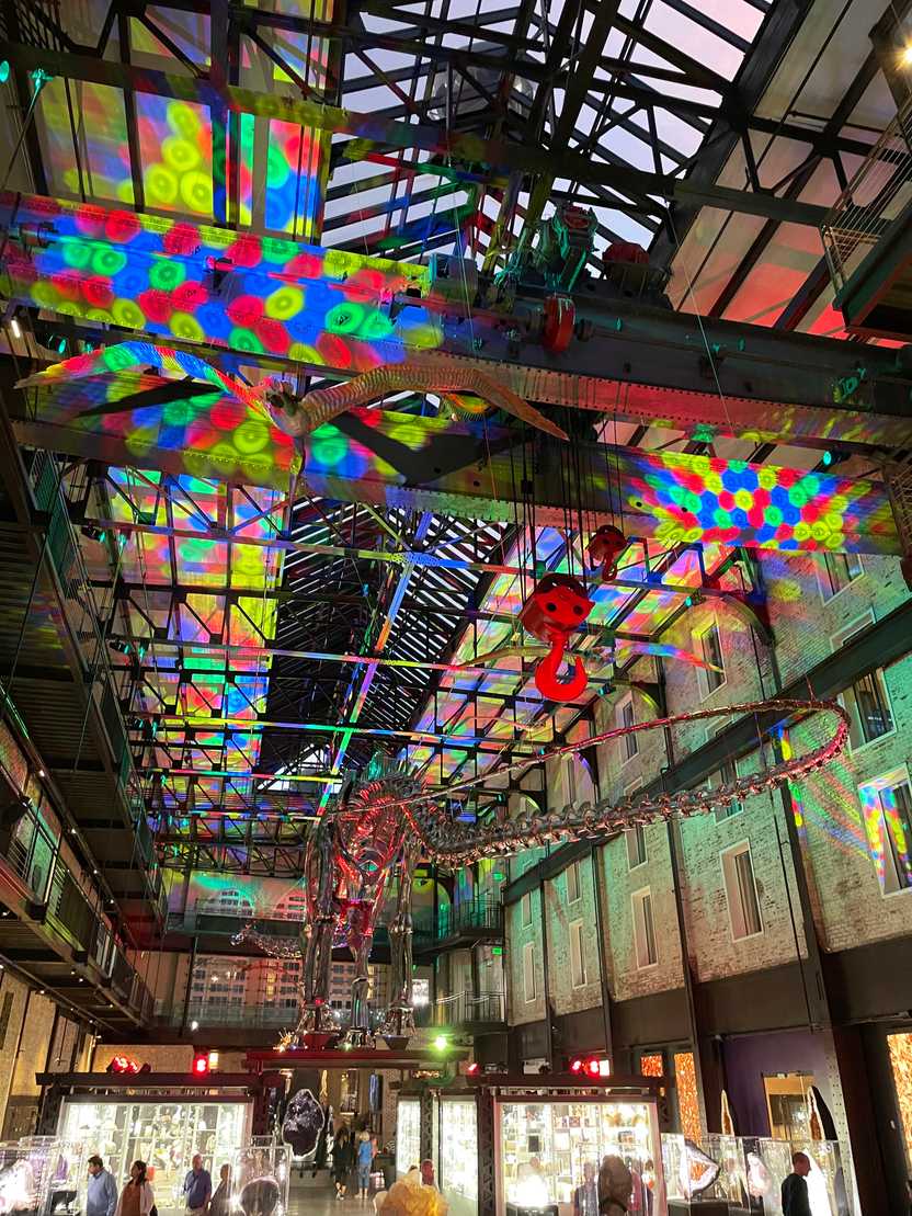 Looking up at the lobby at JW Marriot Hotel Lobby. The ceiling is covered in colorful lights