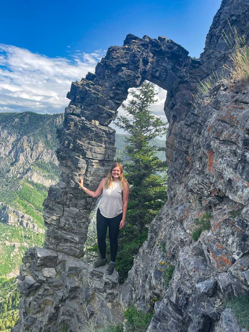 Lydia standing in the arch off of the Sardine Peak trail.