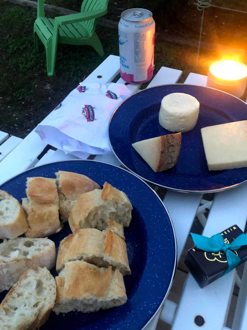 Blue plates with bread and cheese.