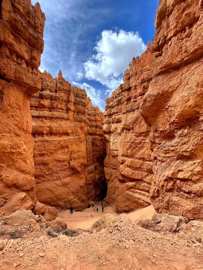 Tall canyon walls with a trail of switchbacks on the Queen's Garden trail.