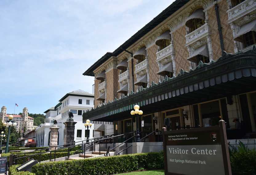 The exterior of the Hot Springs National Park Visitor Center. The building has a brown and tan geometric pattern on the outside.