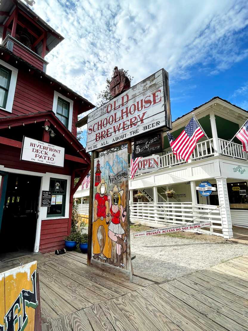 A vintage-looking sign for the Old Schoolhouse Brewery in Winthrop.