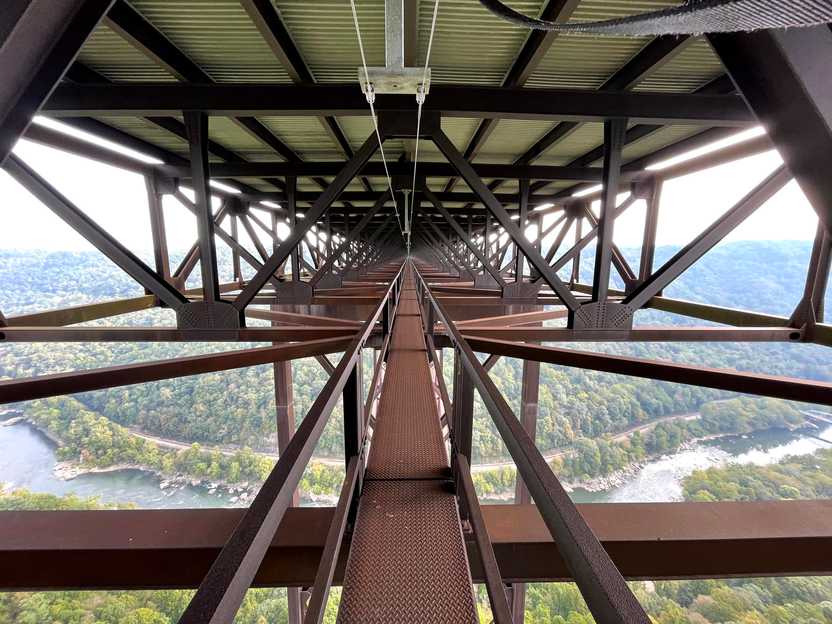 Standing on the catwalk below the New River Gorge Bridge.