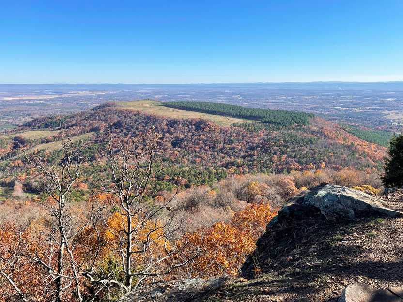 A view of a hill and a valley in the distance from Sunrise Point in Mount Nebo.