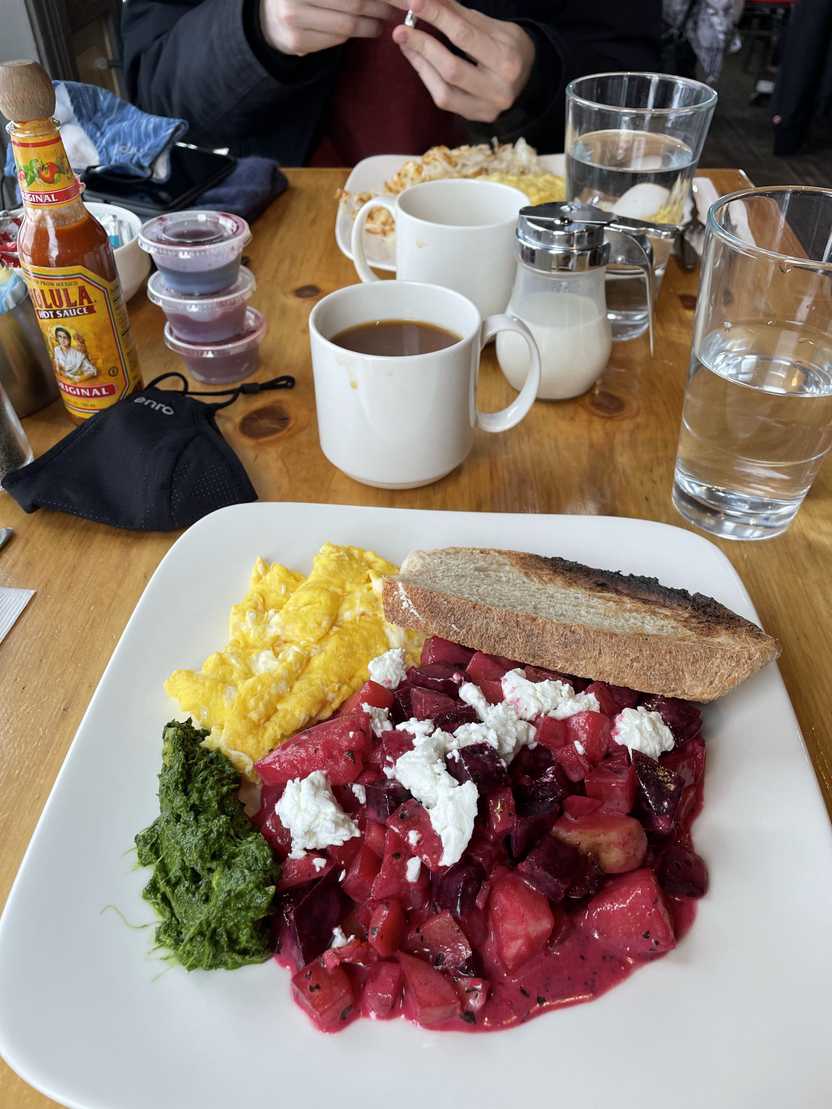 Brunch at Bread and Salt. The plate includes scrambled eggs, a beet and potato hash with feta cheese and toast. Brunch at Bread and Salt. The plate includes scrambled eggs, a beet and potato hash with feta cheese and toast.