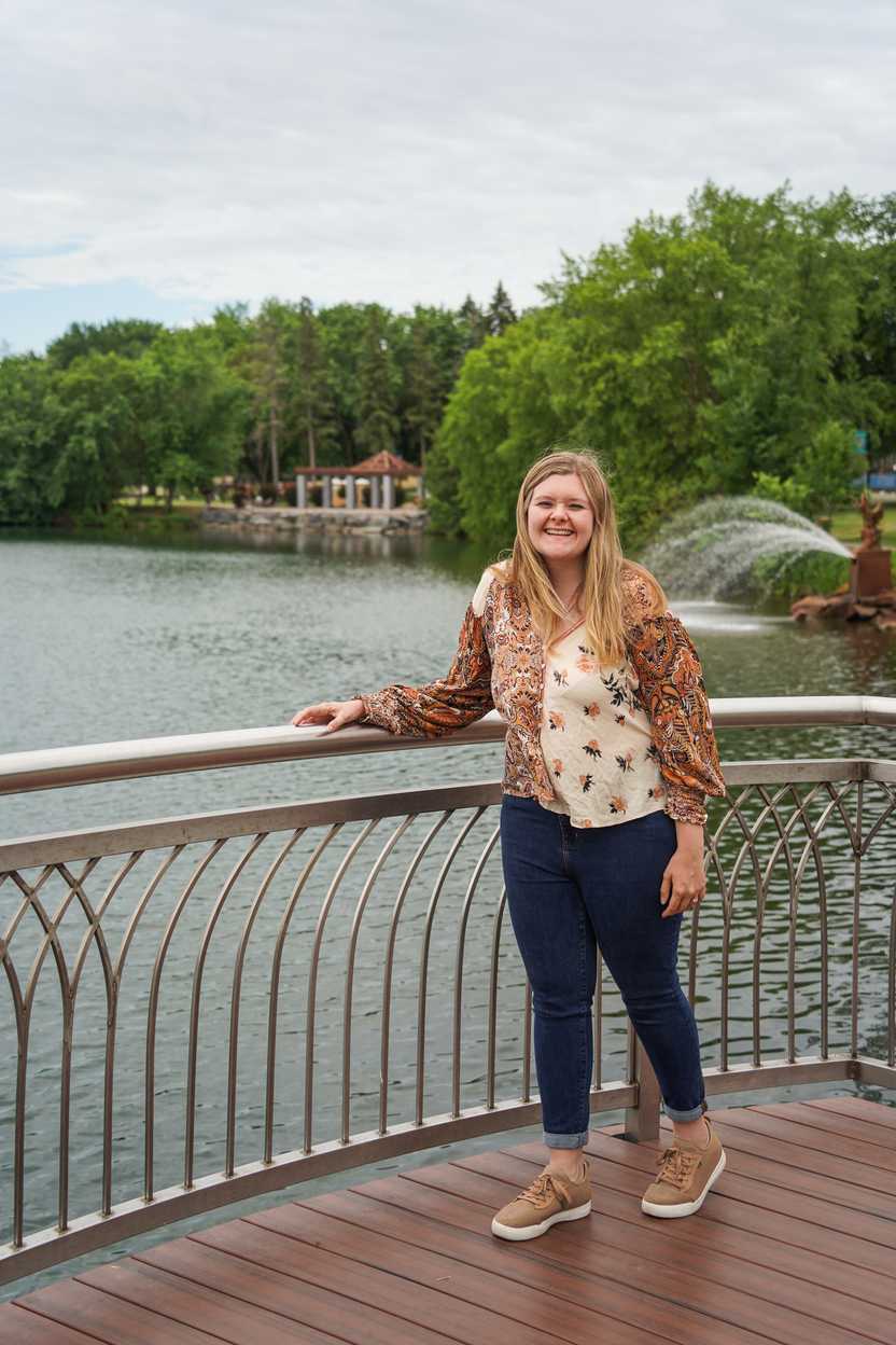 Lydia standing next to Lake George Lydia standing next to Lake George