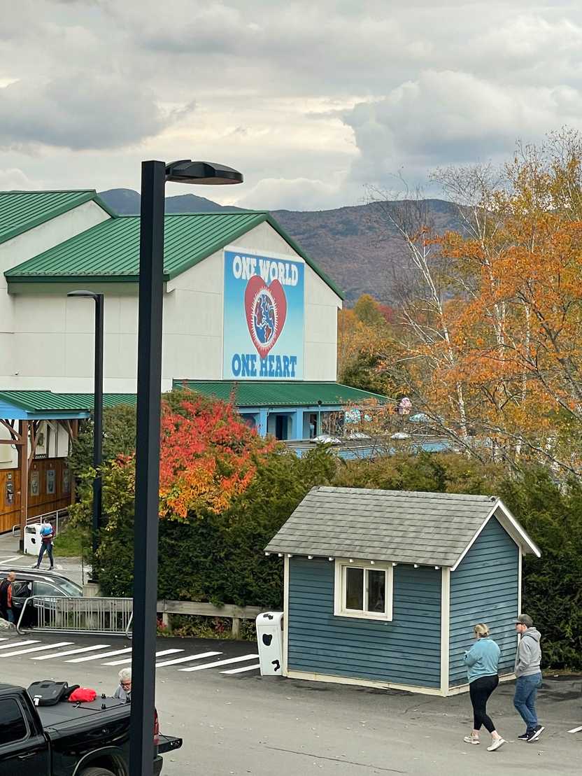 The exterior of the Ben and Jerry's Headquarters. A mural reads "One World One Heart"