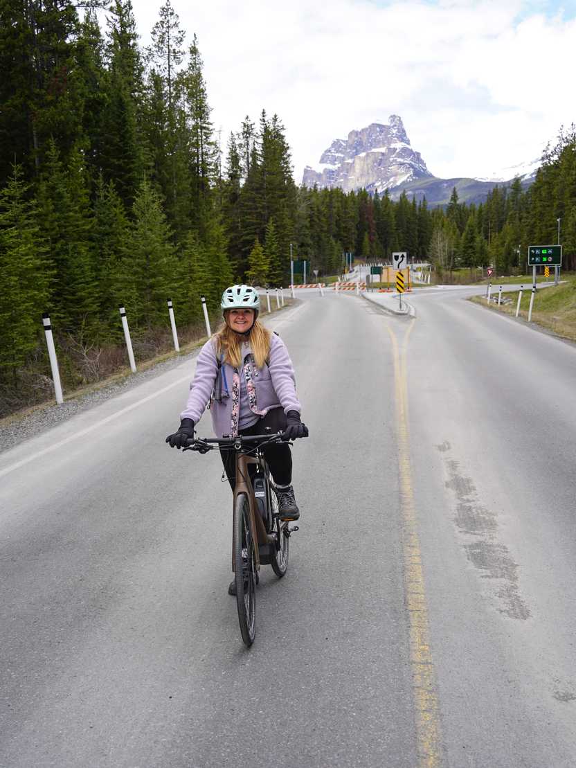 Lydia biking along the Bow Valley Parkway near Johnston Canyon.