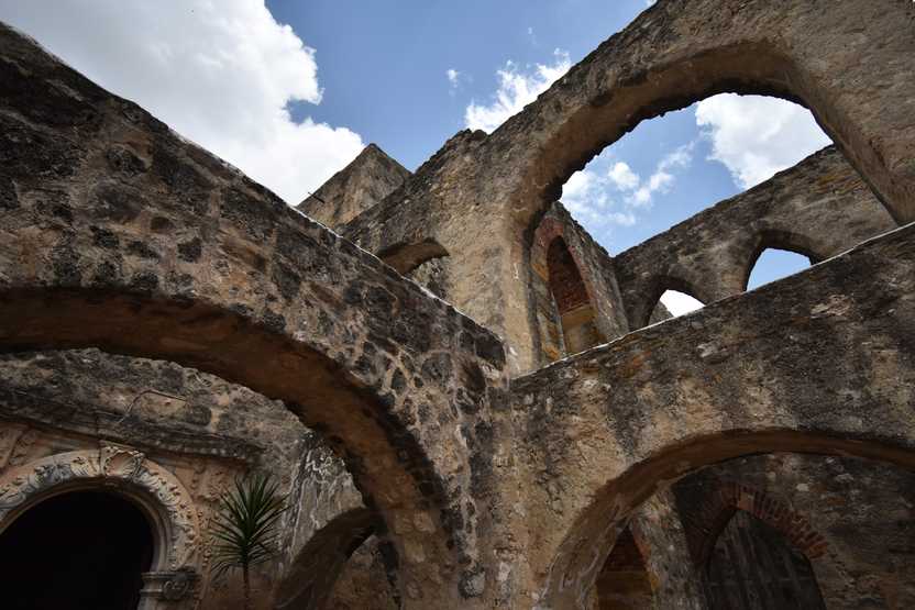 Looking up at arches at Mission San Jose.