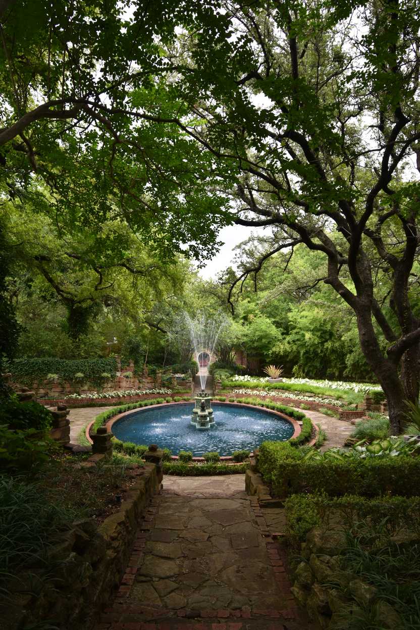 A bright, blue fountain at Chandor Gardens.