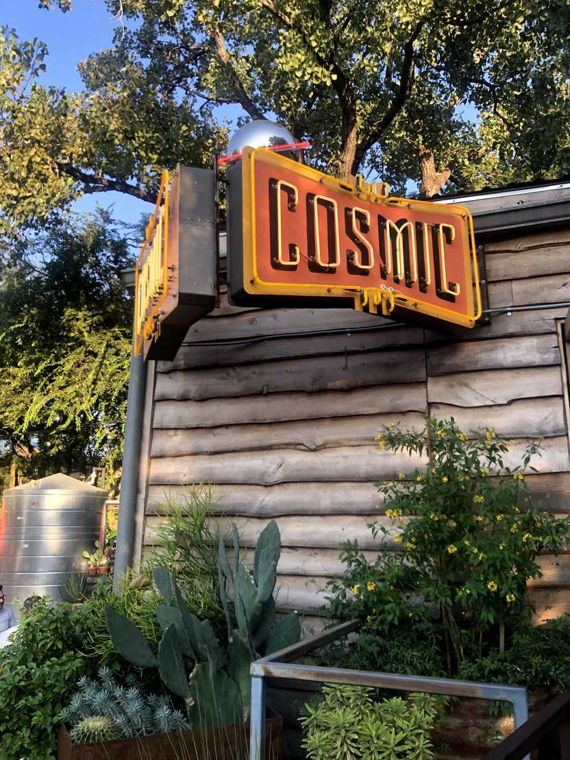 The bright sign for Cosmic Coffee and Beer.